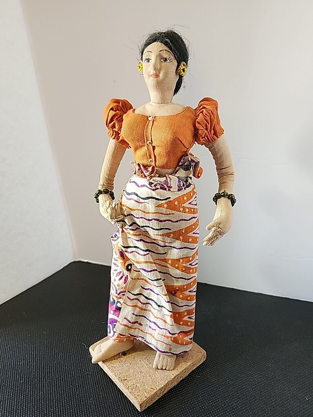 Indian Asian Figurine  Lady in Orange Dress Wood Base