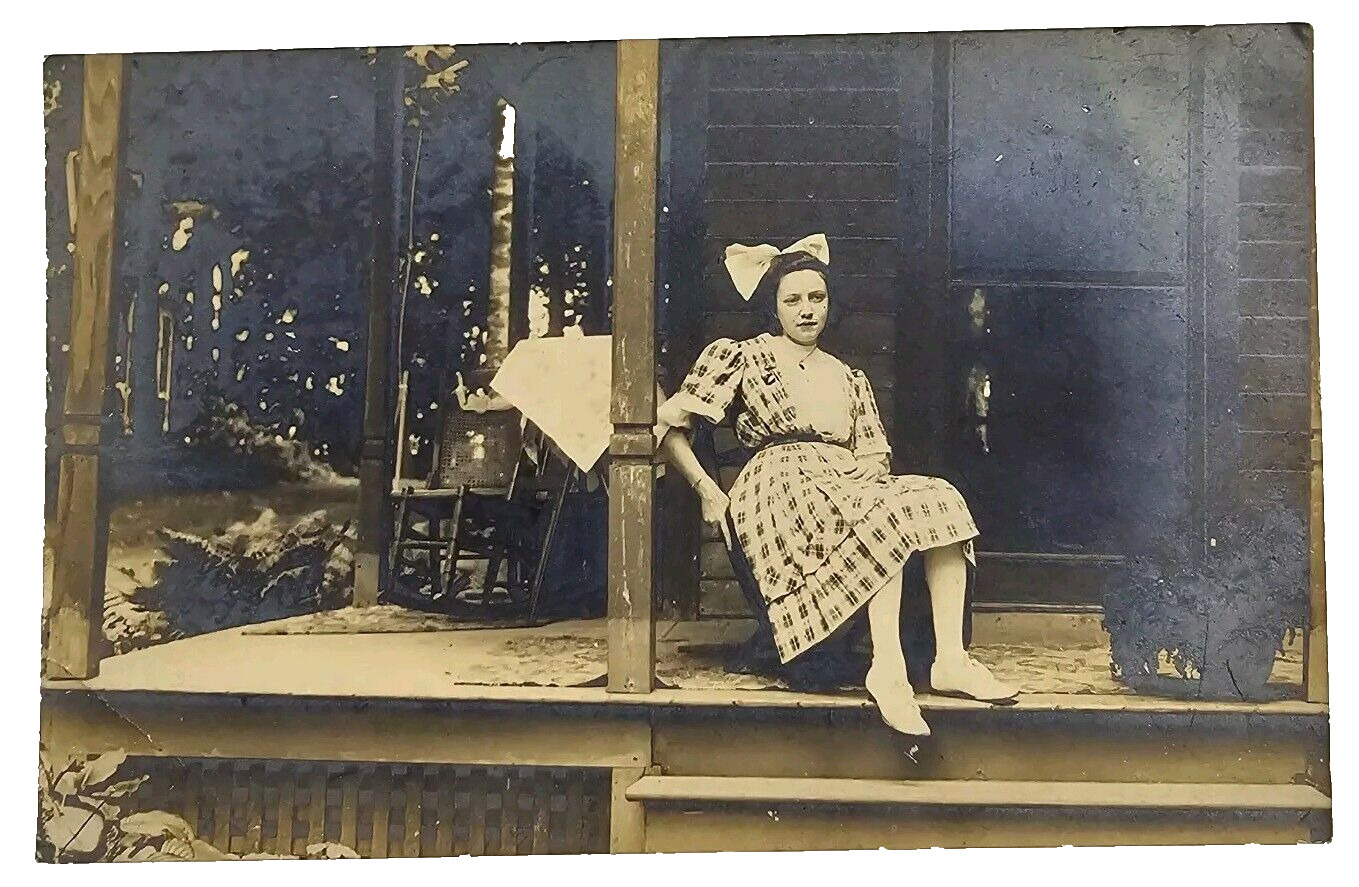 Antique RPPC Candid Photo Victorian Era Pretty Lady Girl Bow Outdoor Porch Cabin