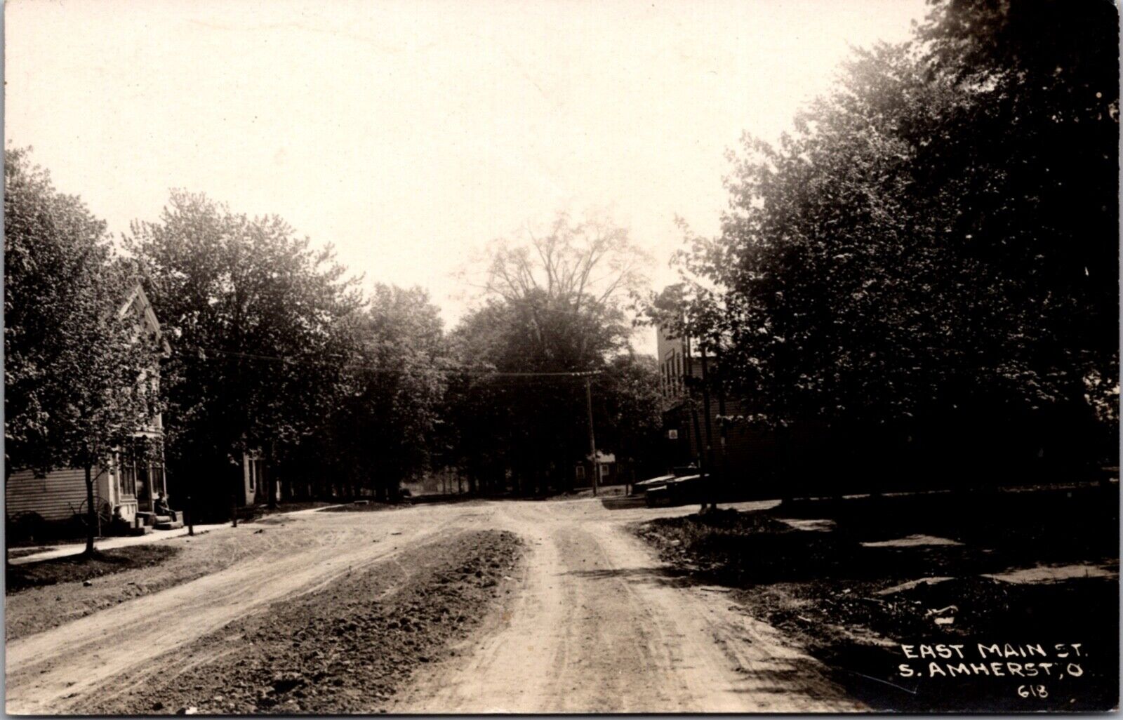 Real Photo Postcard East Main Street in South Amherst, Ohio