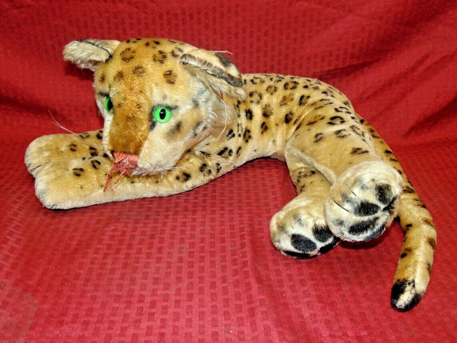 1960'S STEIFF MOHAIR LAYING LEOPARD, TORN NOSE, MISSING TAG, 2' LONG, RIPPED EAR