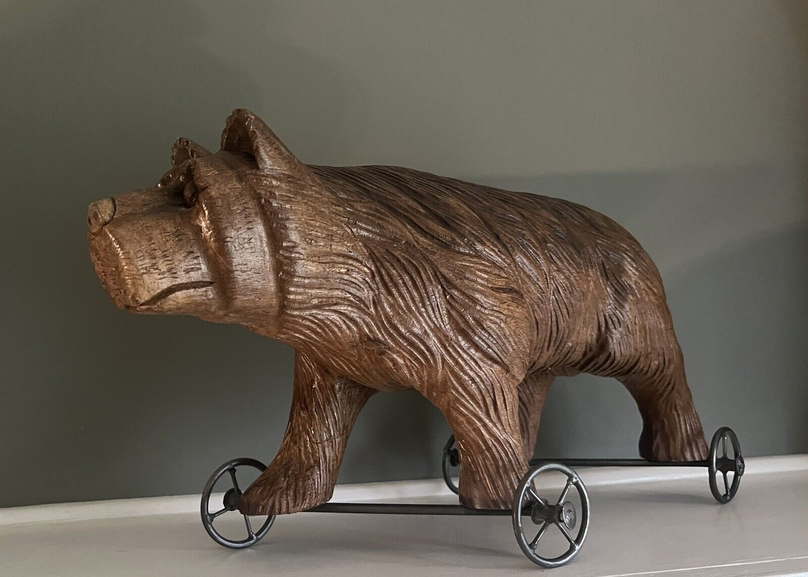 Vintage Carved wood Black Forest Bear On Metal Wheels Pull Toy 21”