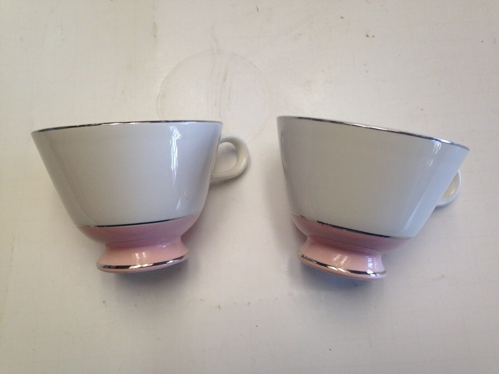 Two Vintage shell pink white tea cups coffee silver band