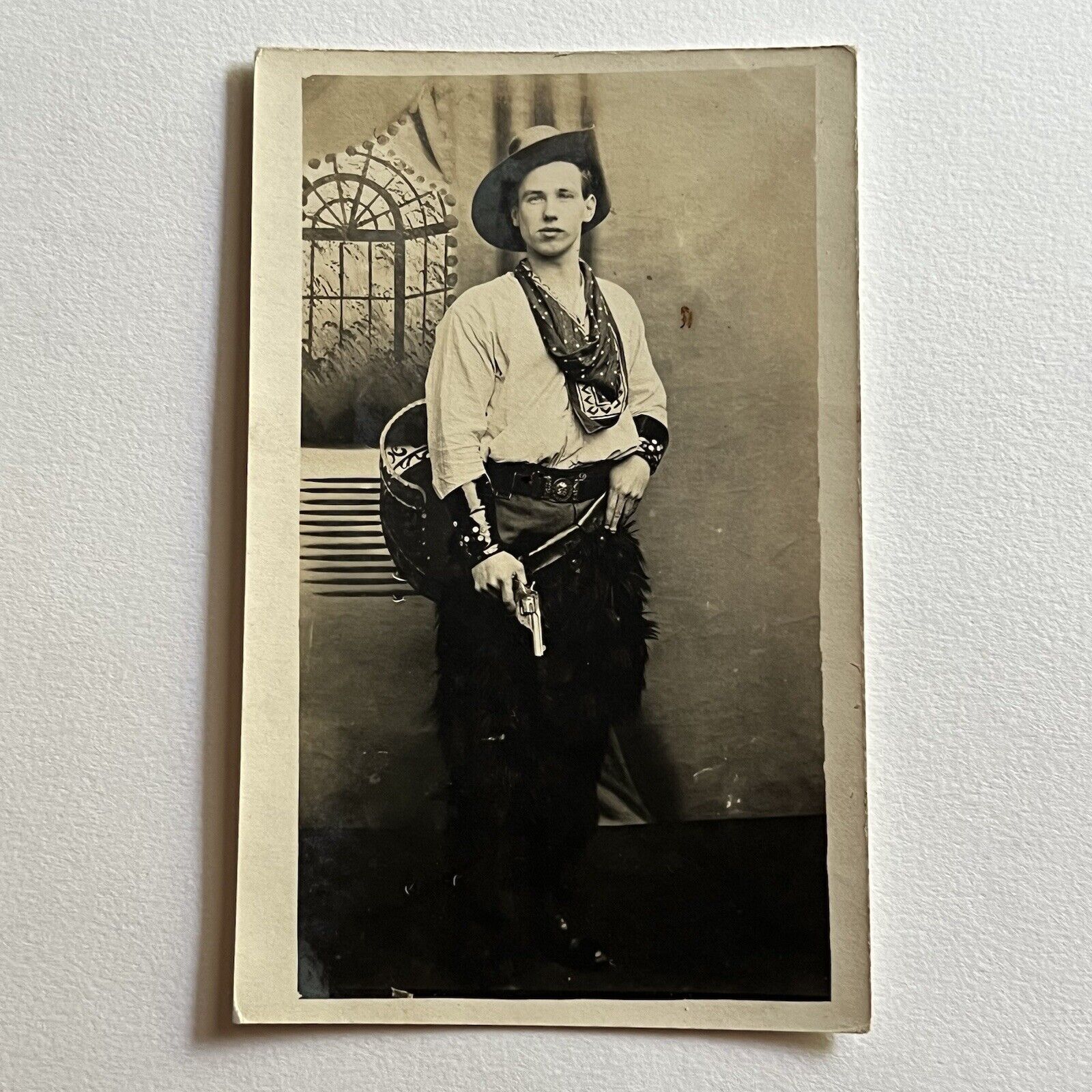 Antique RPPC Real Photograph Postcard Handsome Young Man Cowboy Attire Gun