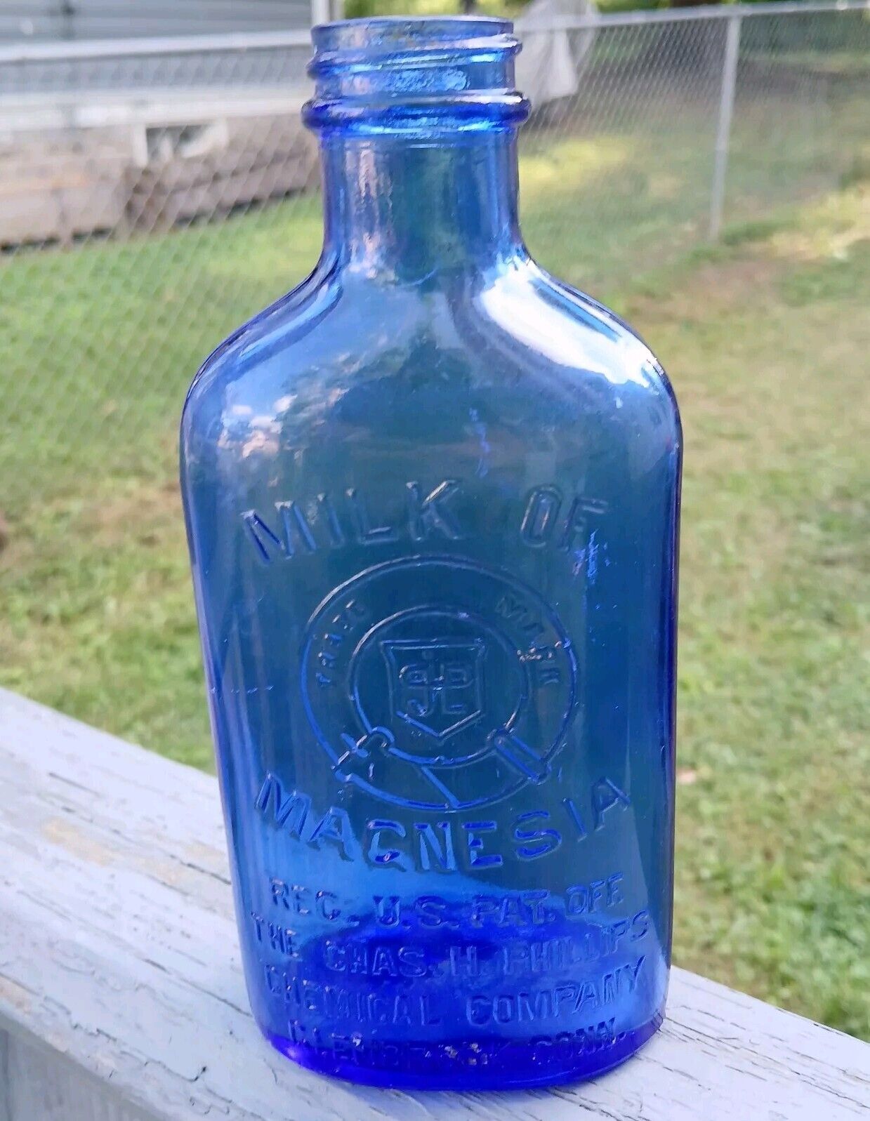 Vintage Embossed Cobalt Blue Glass Bottle PHILLIPS MILK OF MAGNESIA - USA