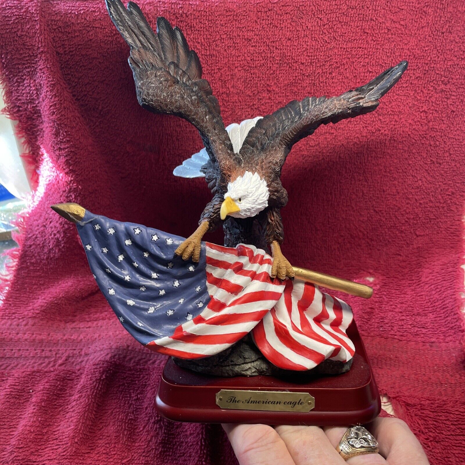 Classic Wildlife Collection Bald Eagle with American Flag in Talons on Wood Base