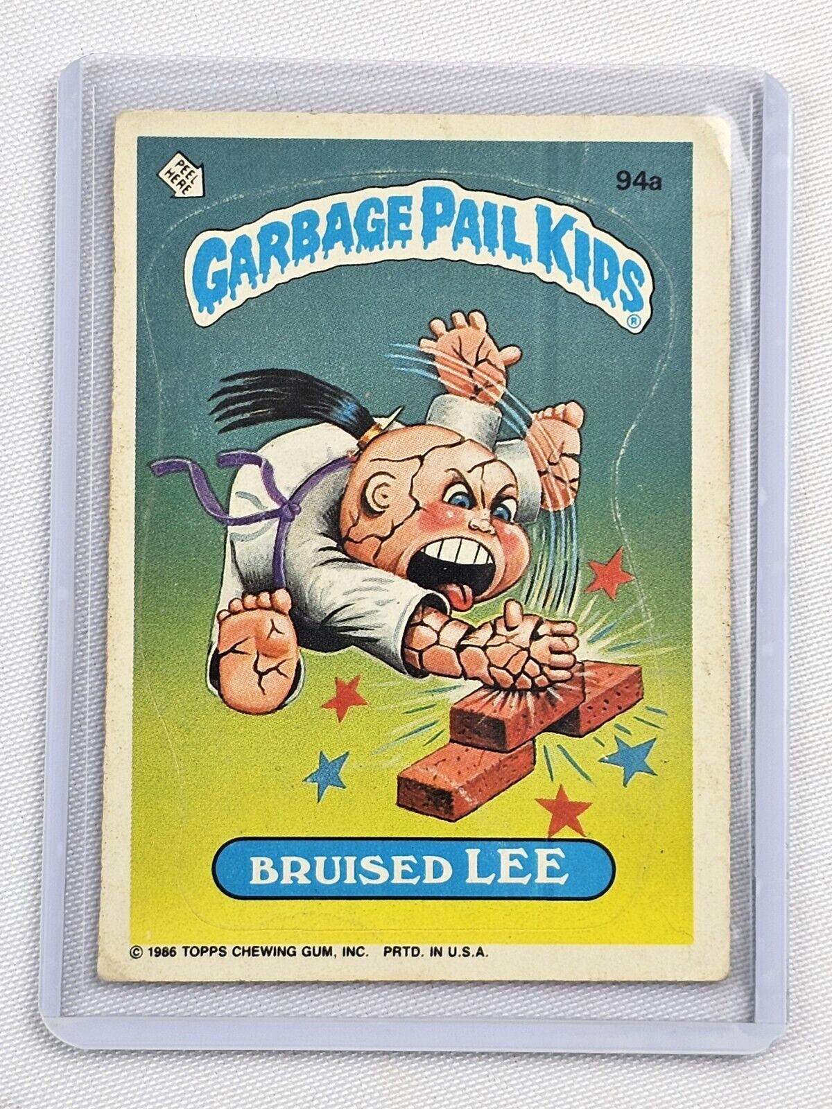 1986 Garbage Pail Kids Series 3  #94a Bruised Lee - Green Belt Error-Mega Rare