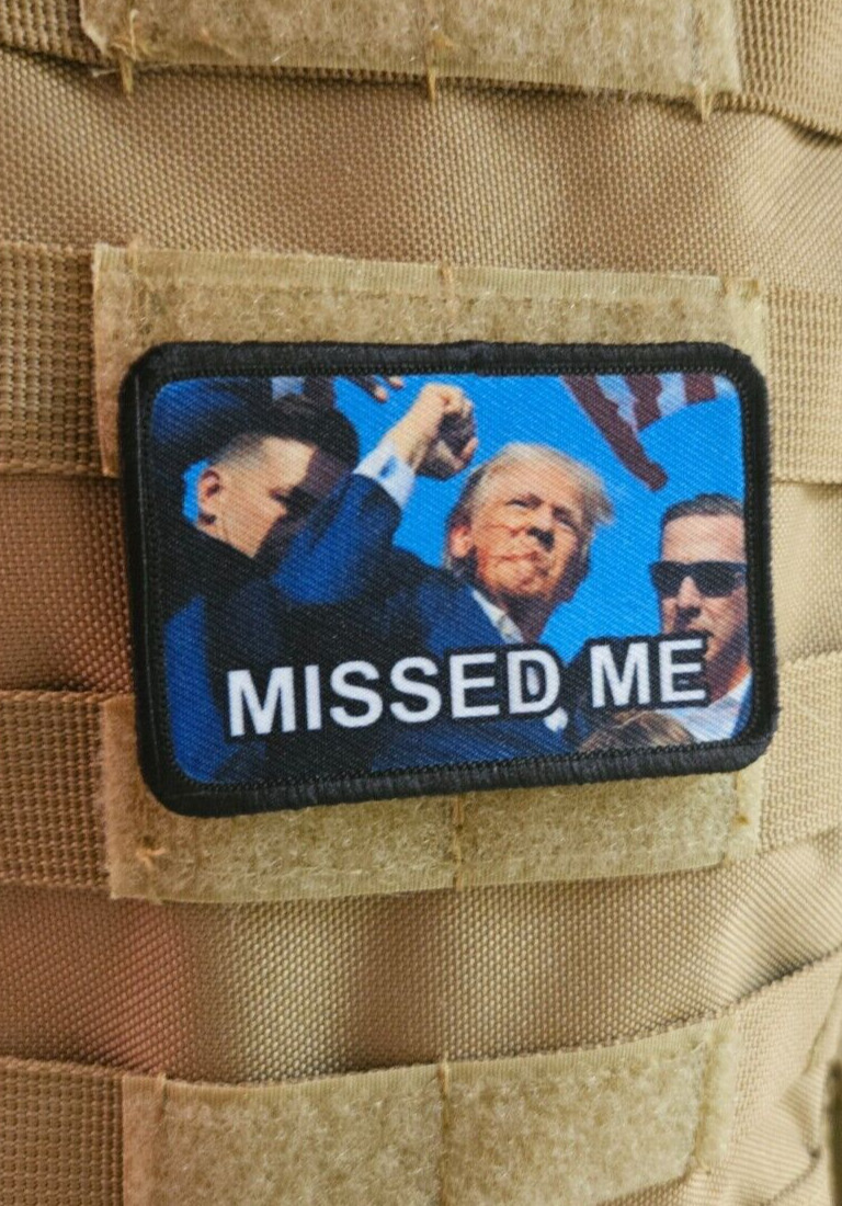 Trump missed me fist raised 2