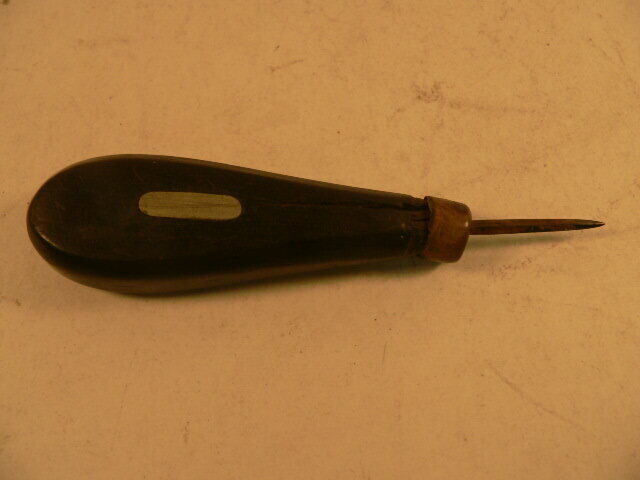vintage small black Wooden Punch