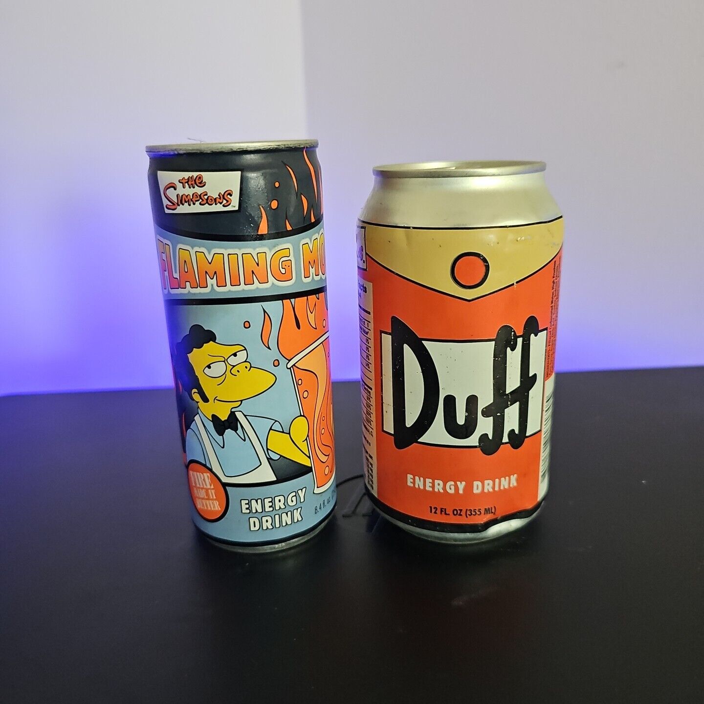 2 Cans of SIMPSONS ENERGY DRINKS (FLAMING MOES & DUFF)= UNOPENED