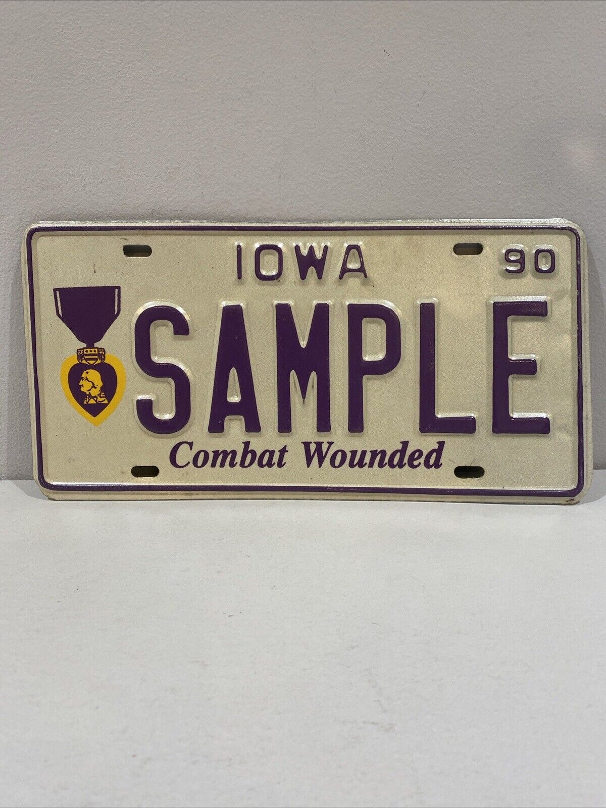 Vintage 1990 Iowa Retired Combat Wounded SAMPLE License Plate Tag Original Metal