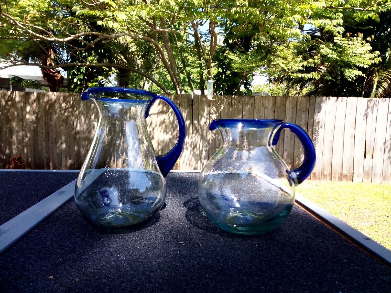 Hand blown Mexican Glass Pitcher With Cobalt Blue Handle and Rim 2 Sizes