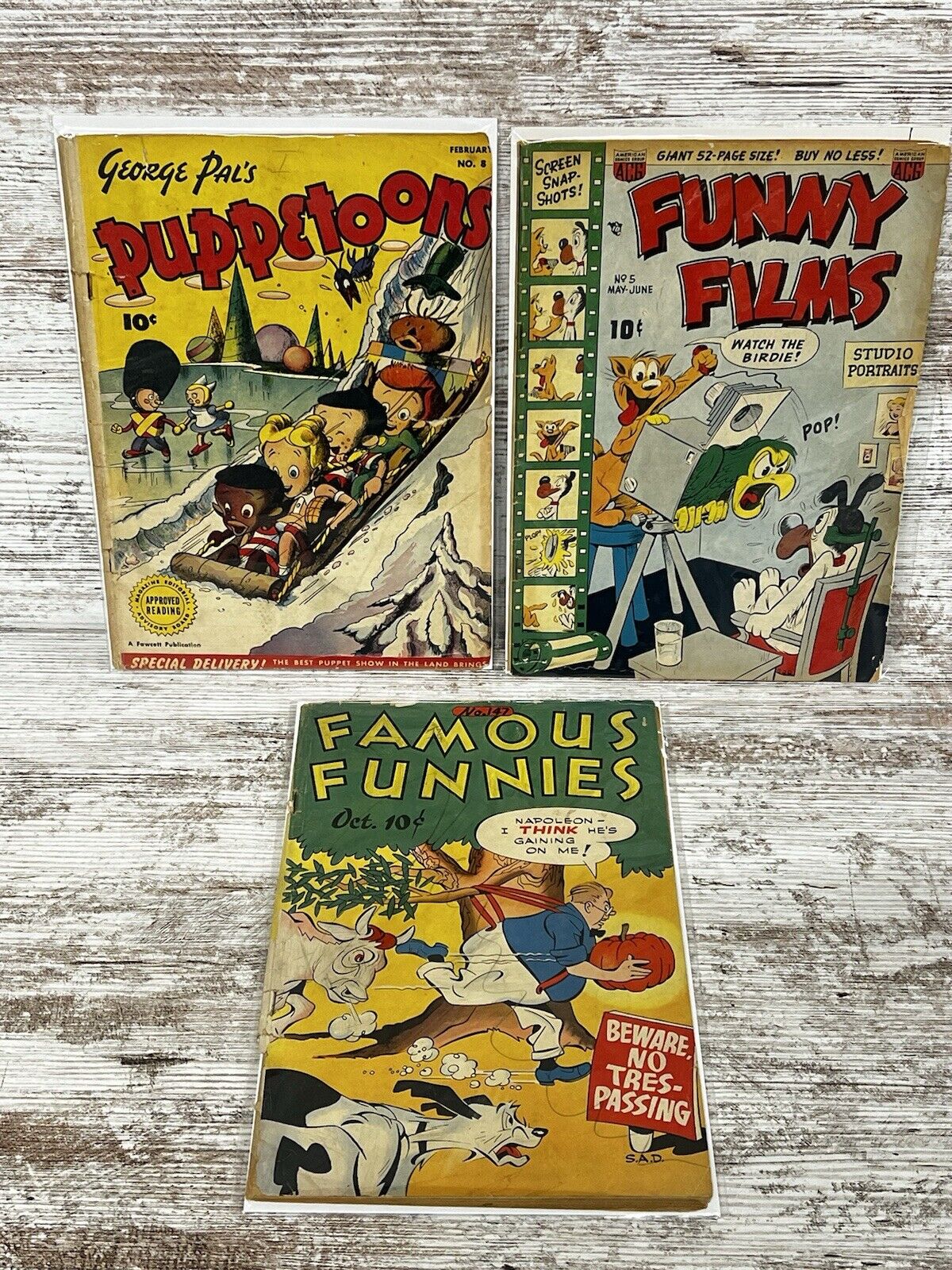 3 Golden Age comics, George Pal's Puppetoons 8 Funny Films 5 Famous Funnies 147