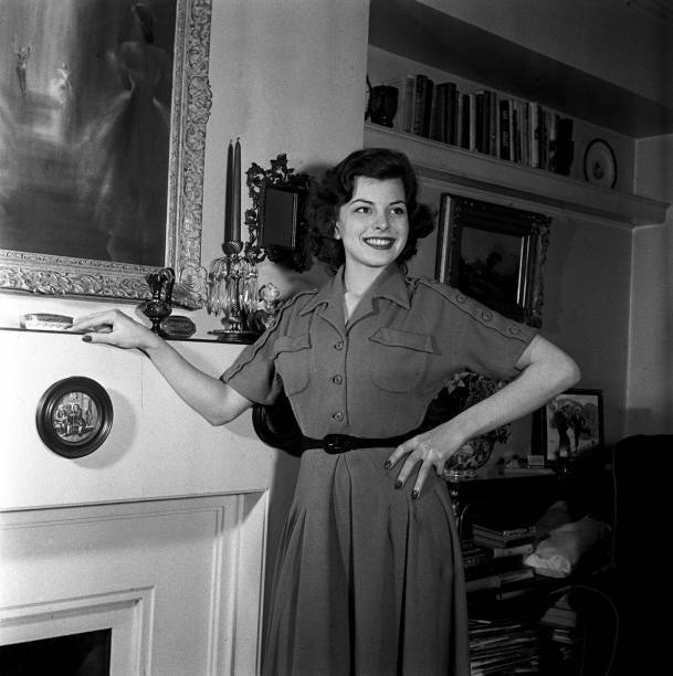 Film Actress Joan Rice Posing Next To Her Fireplace 1951 Historic Old Photo