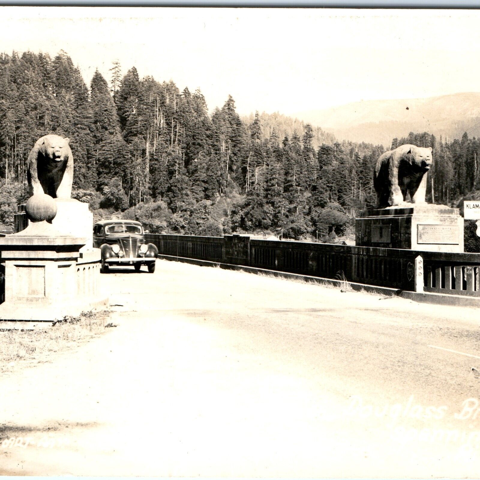 c1940s Klamath, CA RPPC Douglas Bridge US Hwy 101 River Car Bear Statue Cal A164