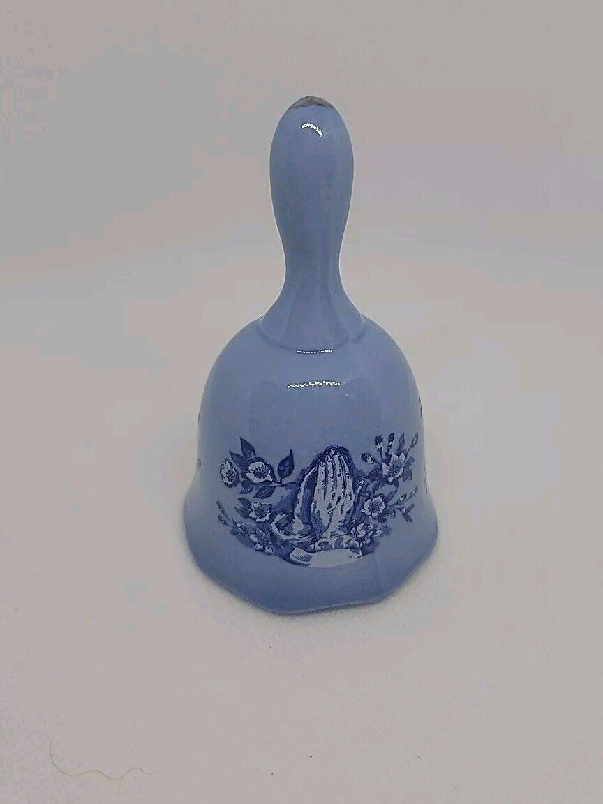 Vintage Blue Praying Hands 1979 Spencer Gifts Collectors Bell. AD