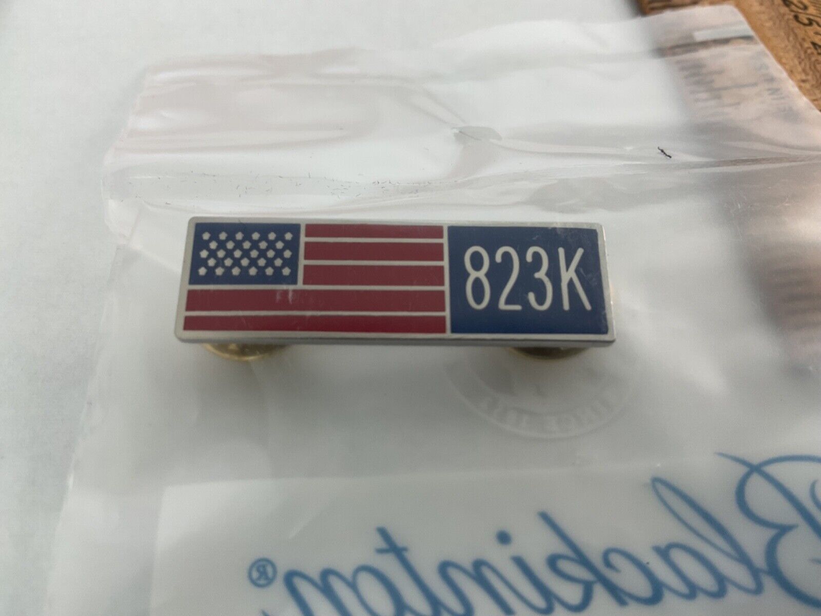Flag pin with 823K added Made by V.H. Blackinton in the USA 1 3/8” by 3/8 wide