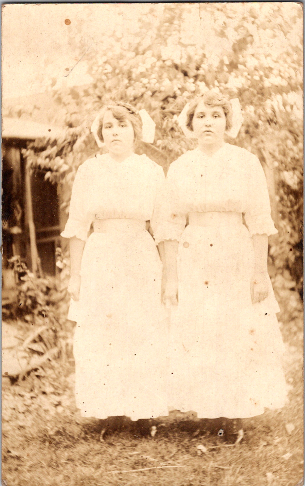 RPPC Cute Girl Twin Sisters Wearing White Dress Matching White Hair Bows C. 1910