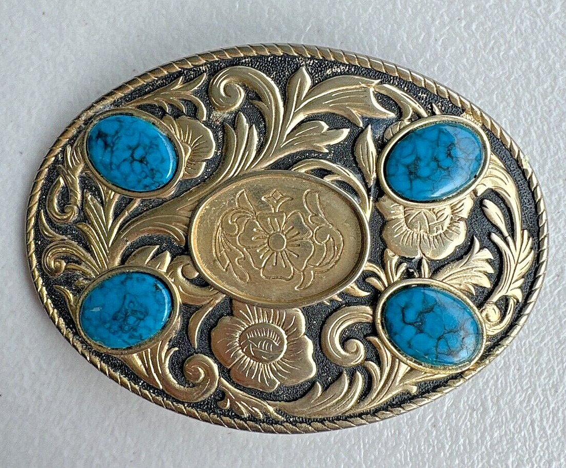 Western style belt buckle, ornate design and turquoise stones