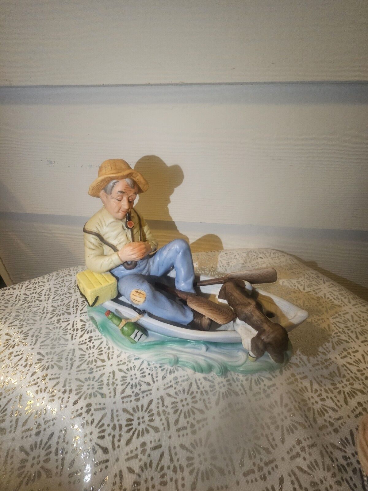 Price Imports  Sleeping Man In Boat  Figurine
