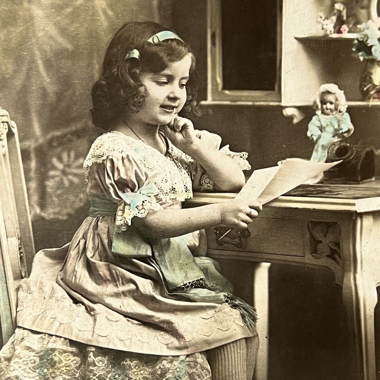 Vintage RPPC Postcard Adorable Little French Girl Reading Letter With Doll