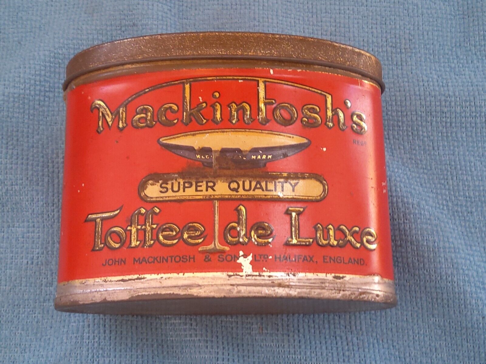 VINTAGE MACKINTOSH'S TOFFEE DE LUXE CANDY TIN RED OVAL HALIFAX ENGLAND