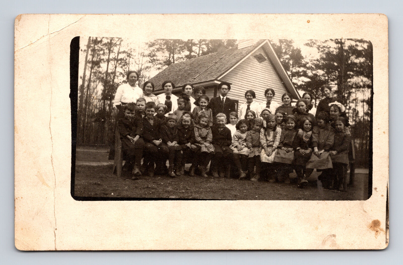 1900s RPPC Unknown Schoolhouse Class Portrait Children Teachers Postcard