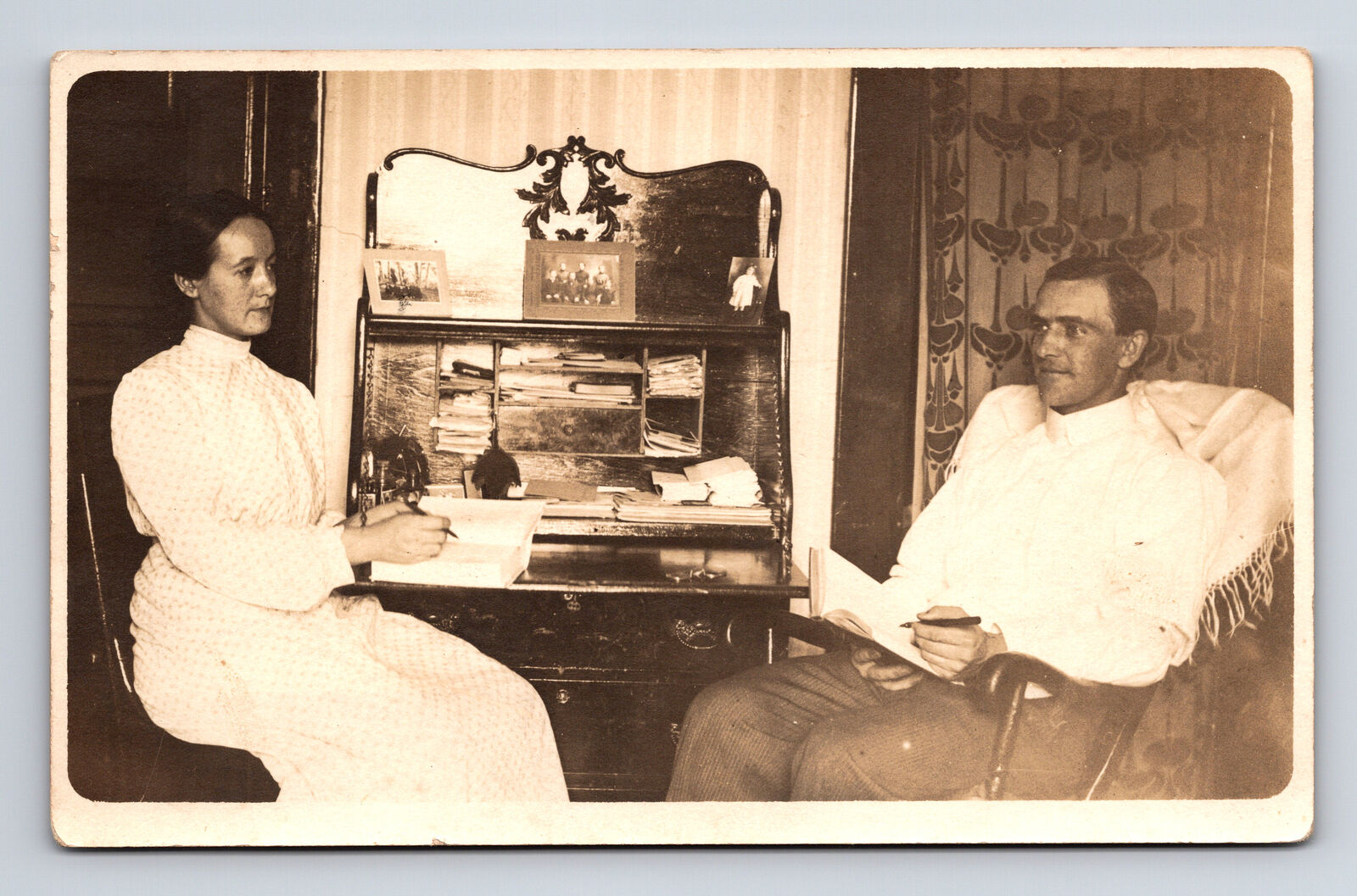 RPPC Interior Portrait of Couple Man Woman Writing Reading at Desk Postcard