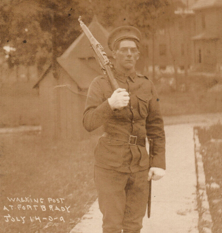 Sault Sainte Marie Michigan Fort Brady Soldier Bayonet Rifle Army RPPC Postcard