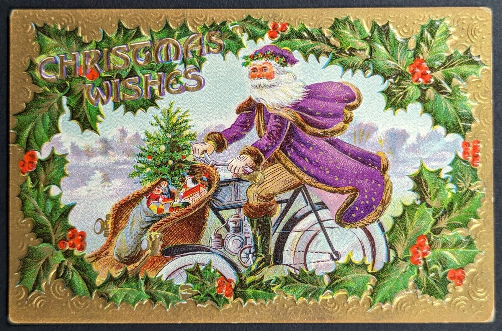 Postcard Vintage Christmas Santa Claus Purple Robe Riding Bicycle Toys