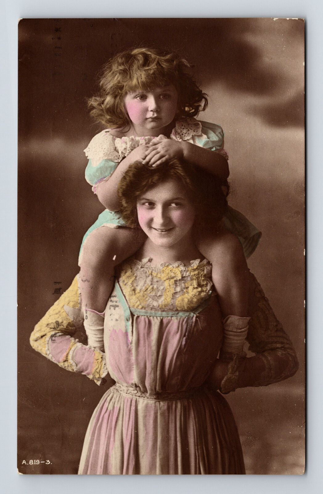 c1915 RPPC Hand Colored Studio Portrait Mother Daughter Piggy-Back Ride Postcard