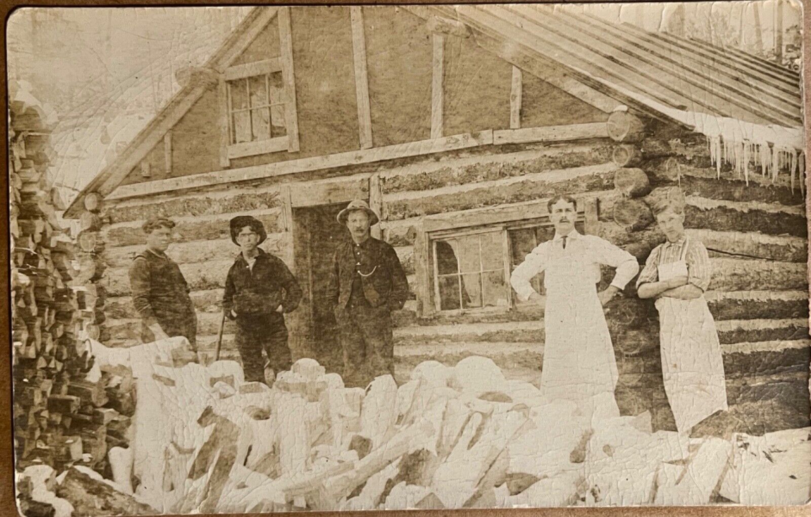 RPPC Homesteaders by Log Cabin in Winter Antique Real Photo Postcard c1900