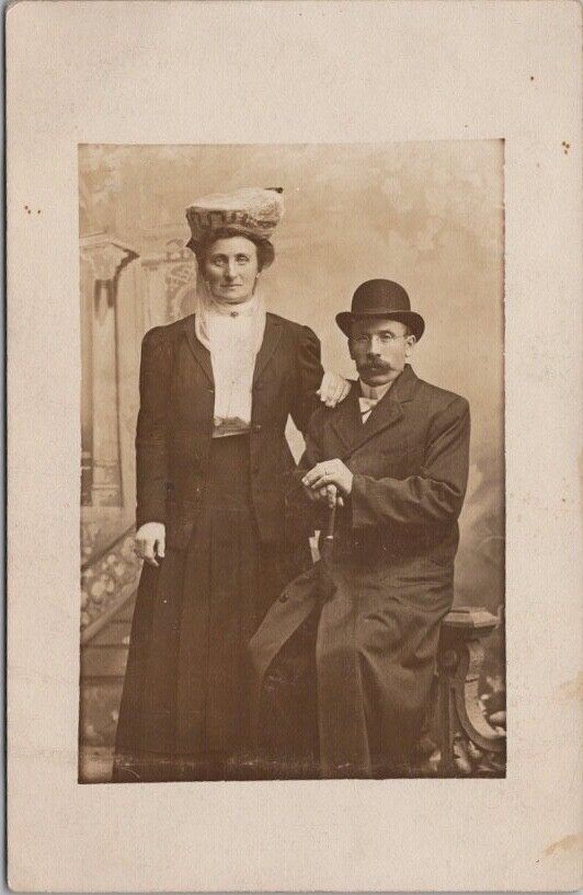 c1910s European RPPC Real Photo Postcard Wealthy Couple / Studio Portrait