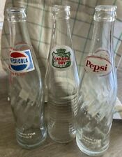 LOT OF 3 VINTAGE BOTTLES 10 OZ PEPSI COLA RED WHITE BLUE 1950’s CANADA DRY GREEN picture
