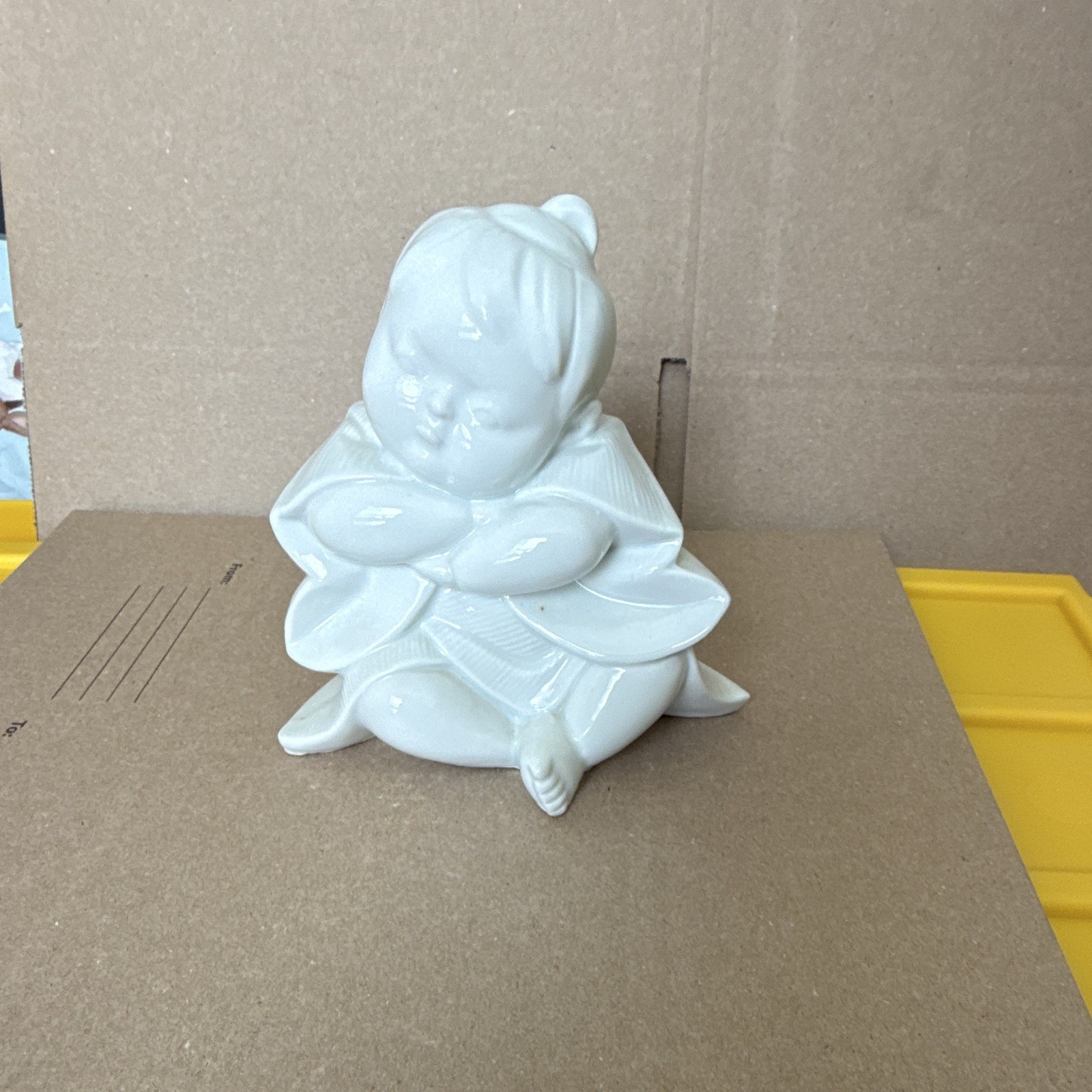 Vintage Figurine Baby Resting