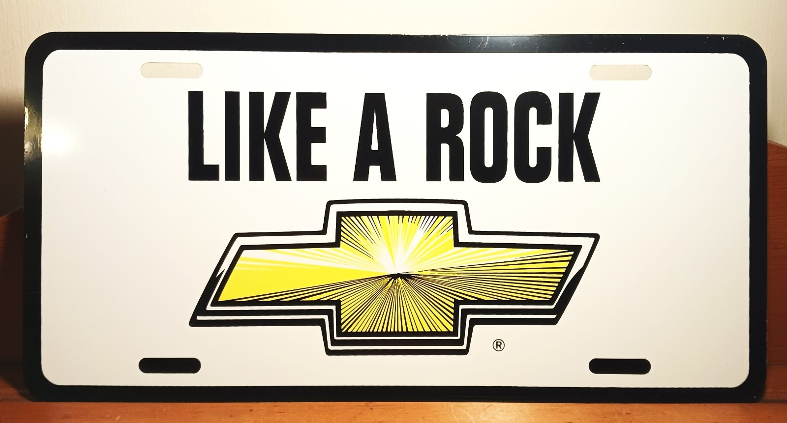 Vintage NOS \'Like A Rock\' Chevrolet Chevy Bowtie Dealer Metal License Plate