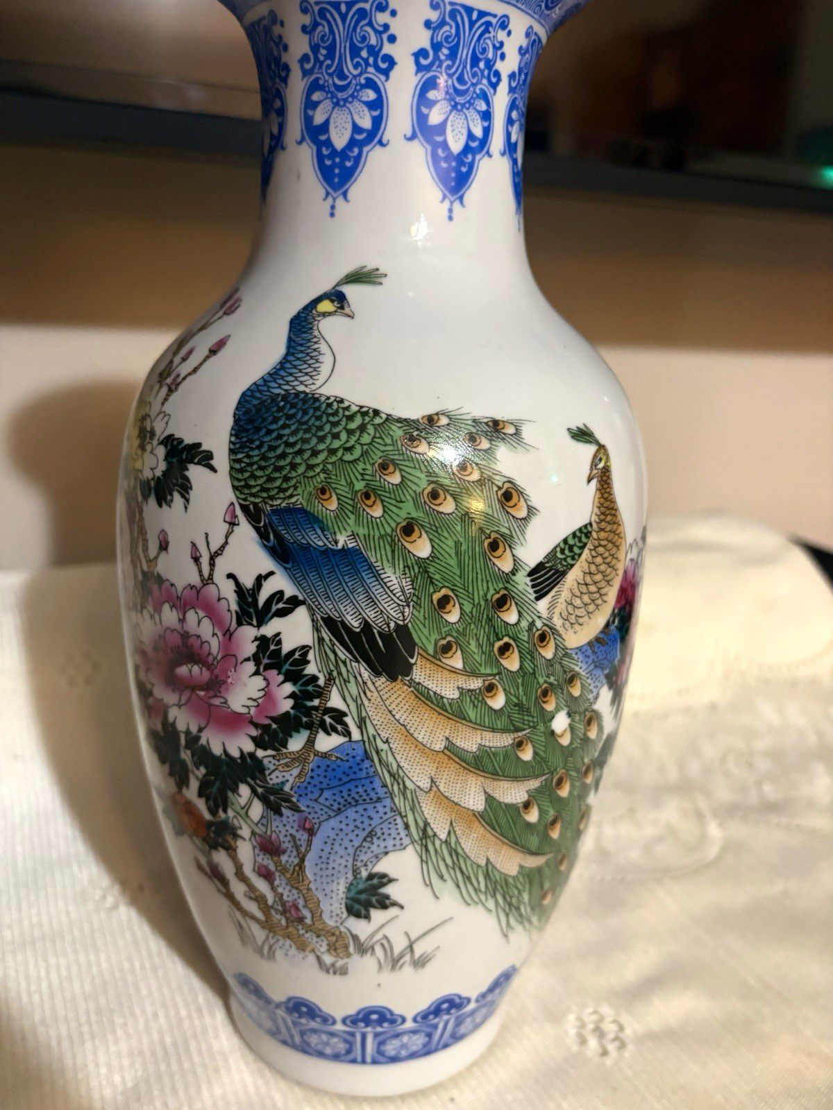 Chinese porcelain vase with peacock bird and floral design collectible