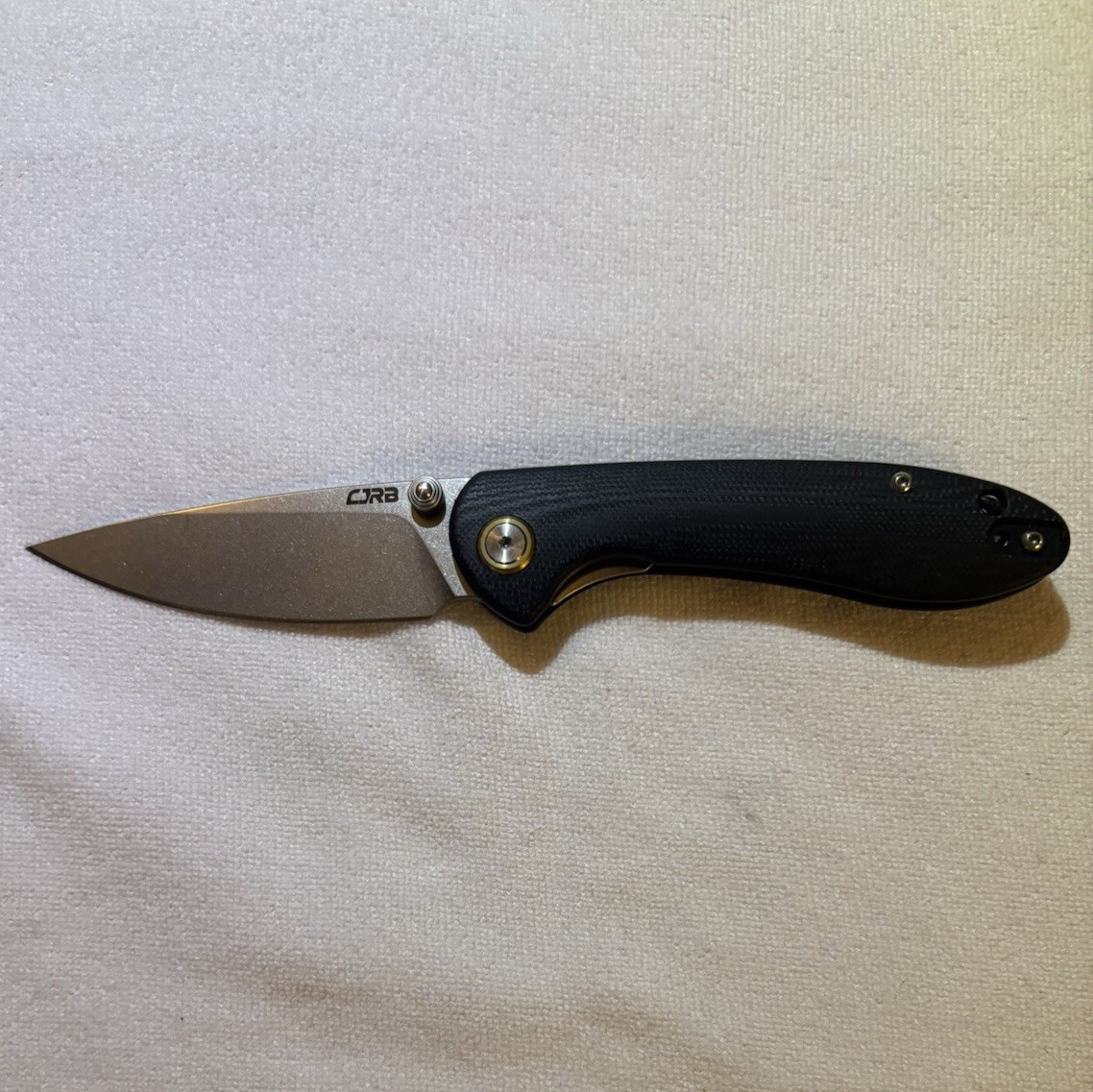 CJRB Feldspar, small. D-2 steel. Black G-10 handle, stonewash blade. Liner lock.