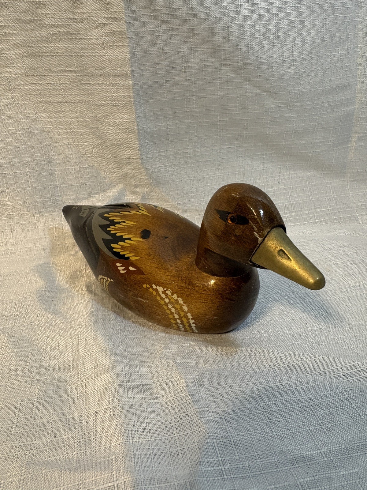 Vintage Carved Wooden Hand Painted Duck Decoy figurine 6.75” L 3” H brass nose