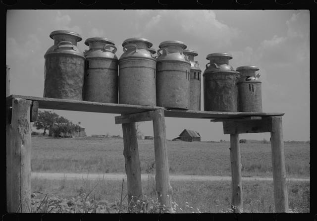 Photo:Milk cans along the road near Greensboro, Alabama