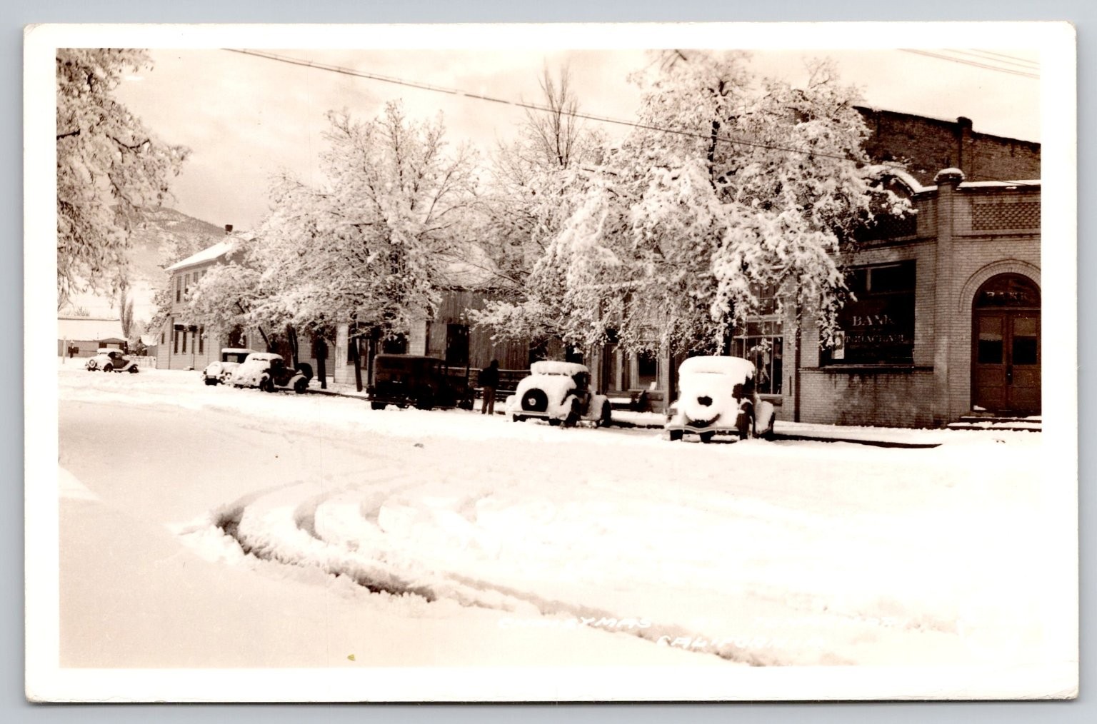 1930s Christmas Snow Tehachapi CA Bank Commercial Loans Sign RPPC by Frasher's
