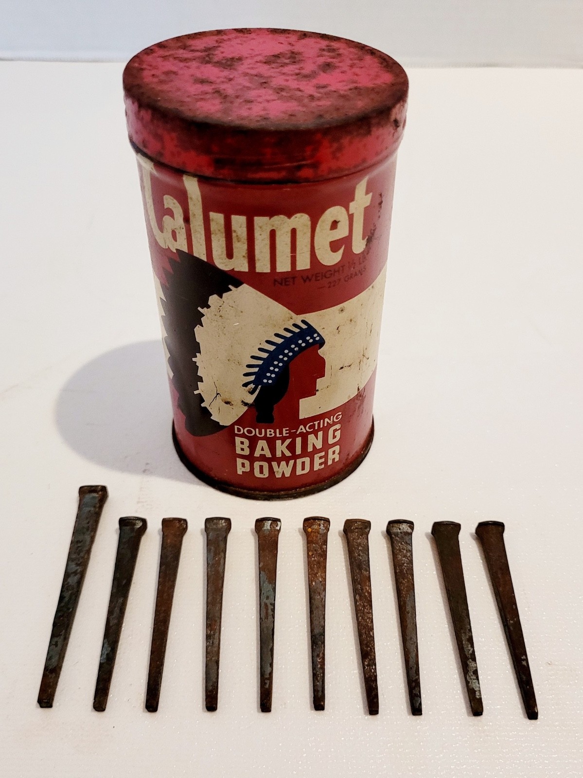 VTG 1950 CALUMET BAKING POWDER TIN W/OLD SQUARE-HEADED NAILS-10 OF THEM