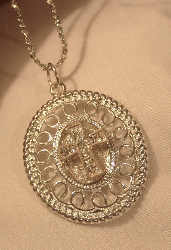 Lovely Swirl Rimmed Silvertone Raised Rhinestone Cross Oval Pendant Necklace