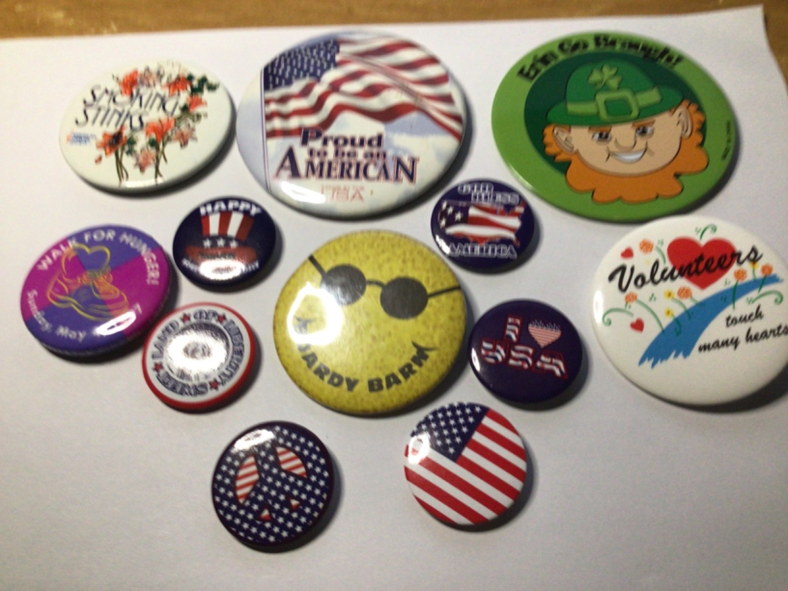 Twelve various Buttons.