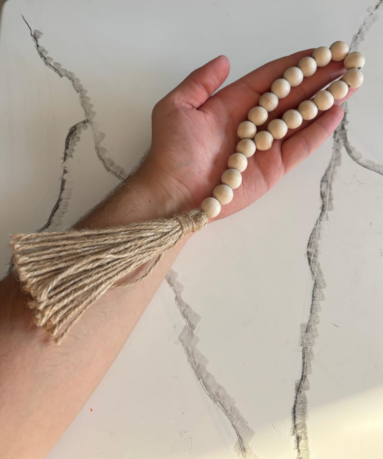 A beautifully handcrafted wooden Tasbih designed to combine simplicity, elegance
