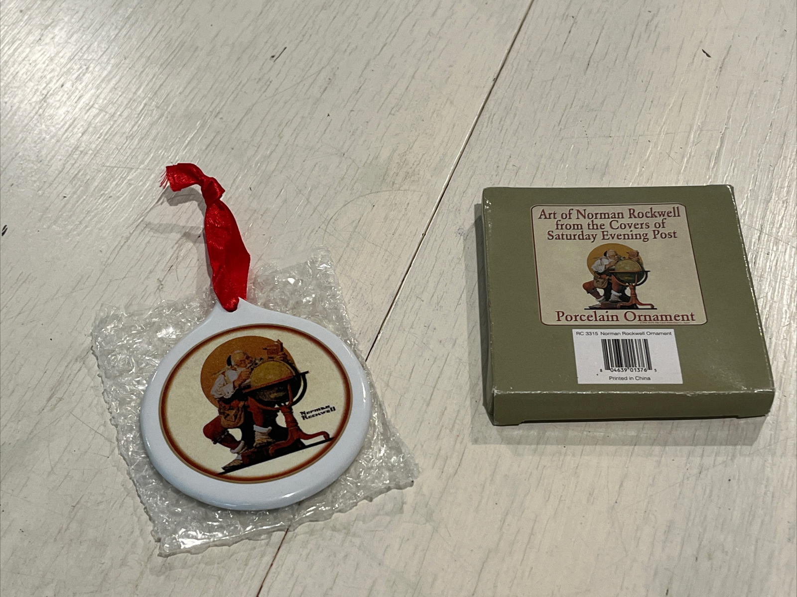 Vintage Norman Rockwell “Santa Claus At the Globe” Porcelain Christmas Ornament