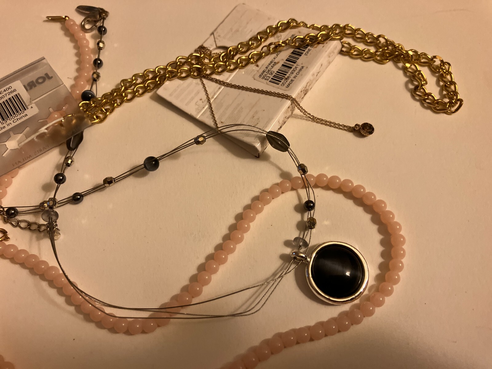 vintage estate lot of necklace. pink bead, chain, black cabocon