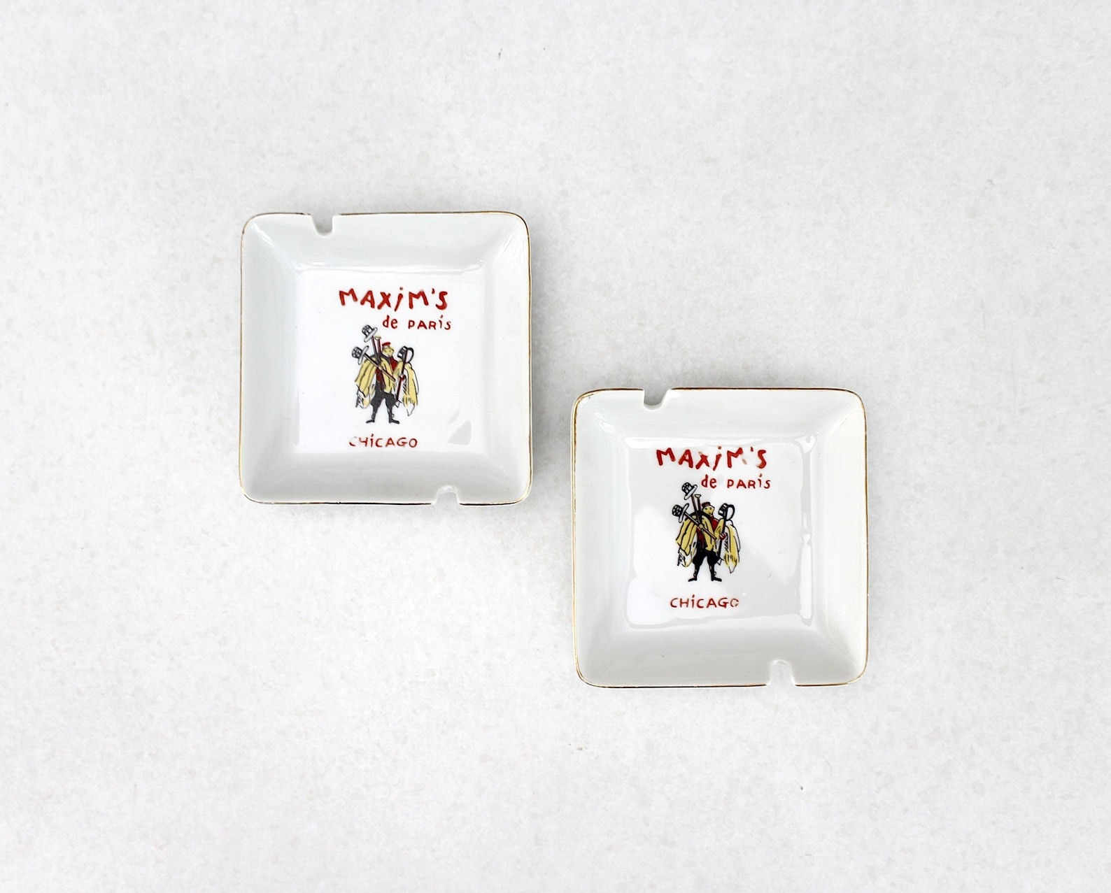 2 Maxim\'s de Paris Chicago Ceramic Ashtrays Mid Century Gold Trim 1960s 2 Maxim\'s de Paris Chicago Ceramic Ashtrays Mid Century Gold Trim 1960s