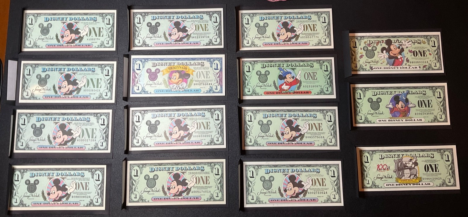 Lot of 15 $1 Mickey Mouse bucks. Uncirculated - In very good condition.