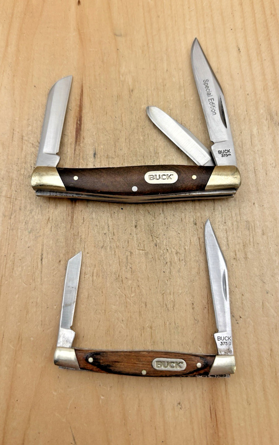 Two Buck Pocket Knives models are 373 Dated 2013 and 375 Dated 2016