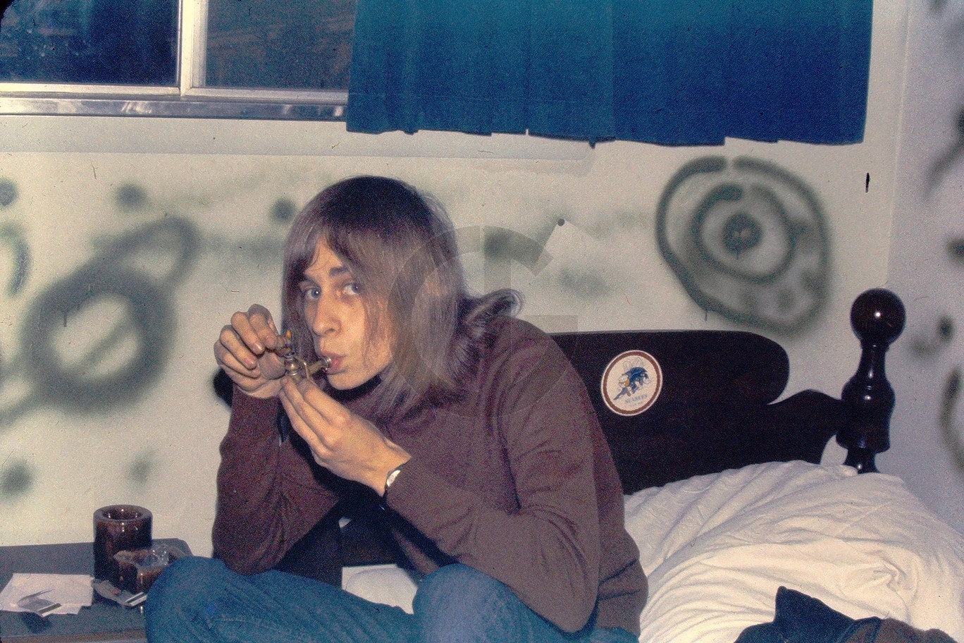 Skinny Hippie Man Lighting Pipe in Bedroom w/Graffiti on Wall: 1970's 35mm Slide